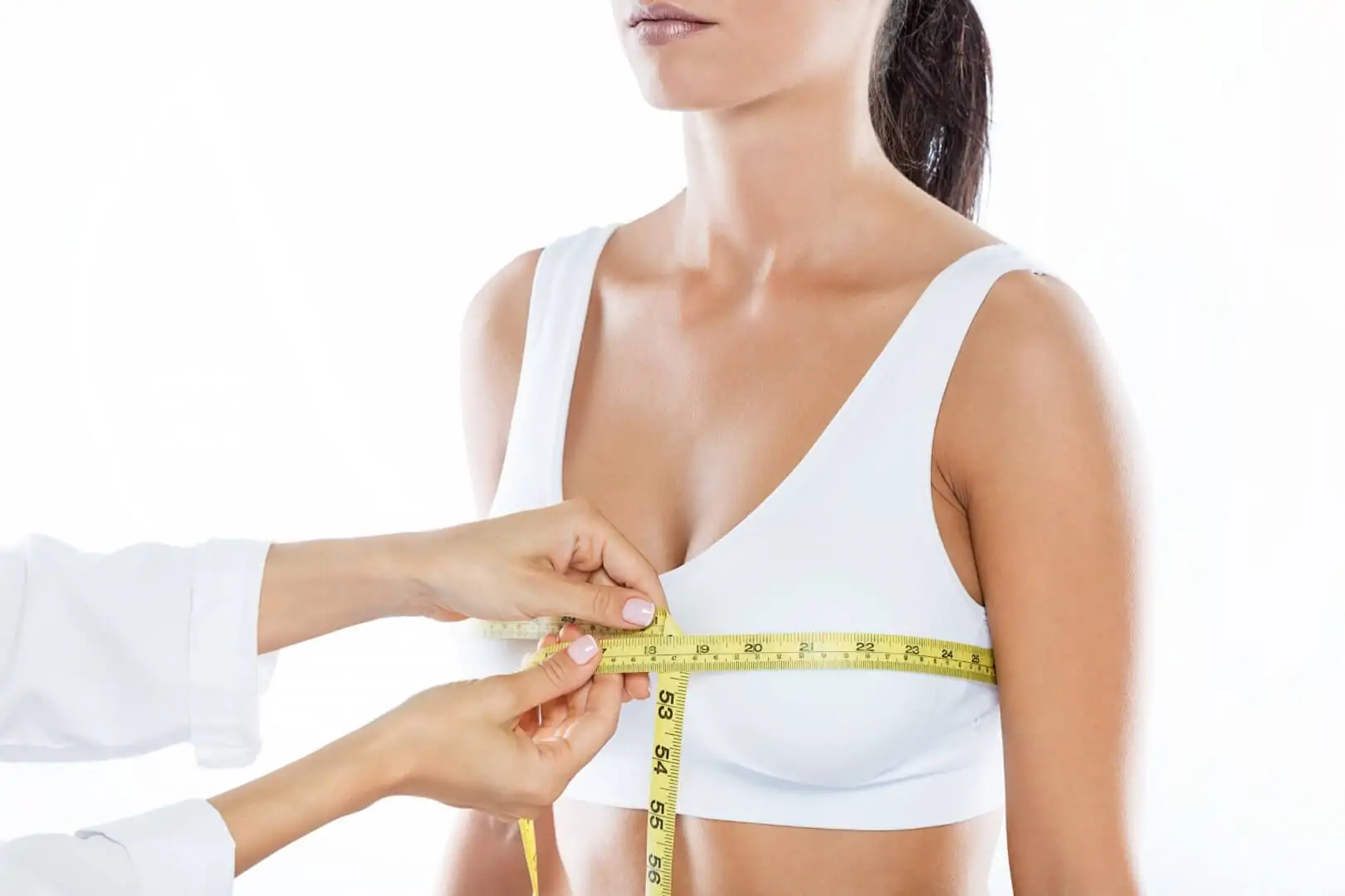 doctor-with-measure-tape-measuring-size-patient-s-breast-Buyuk.jpg